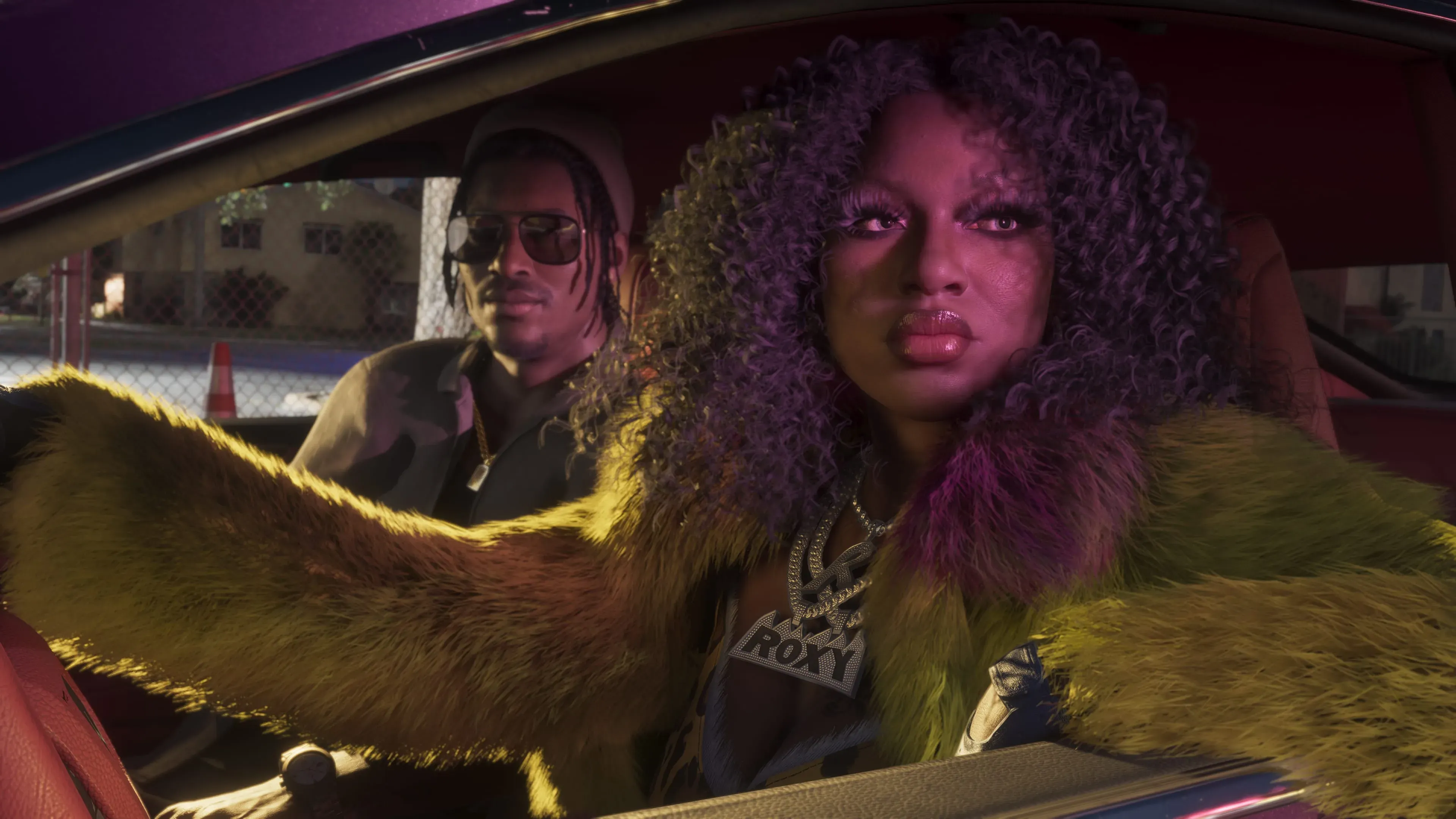 Roxy at the wheel of a car, with Dre'Quan Priest beside her in GTA 6.