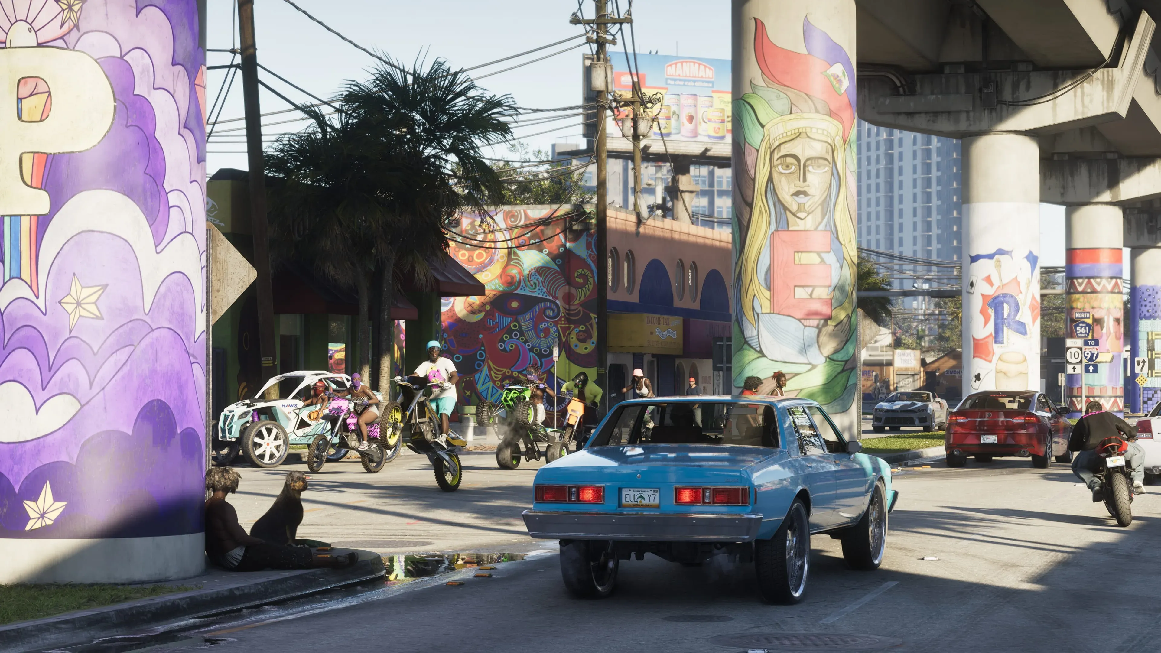 Motorcycle and quad riders beside traffic beneath colorful painted columns in Vice City.